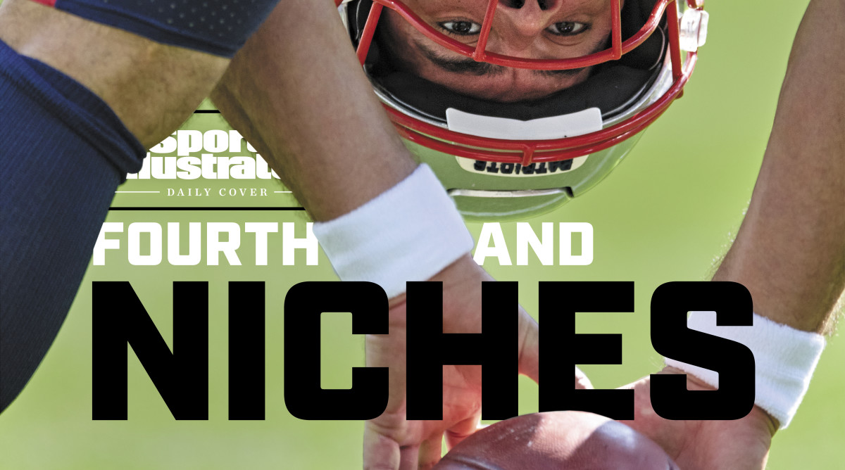 Patriots long snapper Joe Cardona looks back between his legs